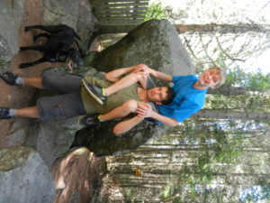 Brad with cousin Ben on his shoulders and Trix watching